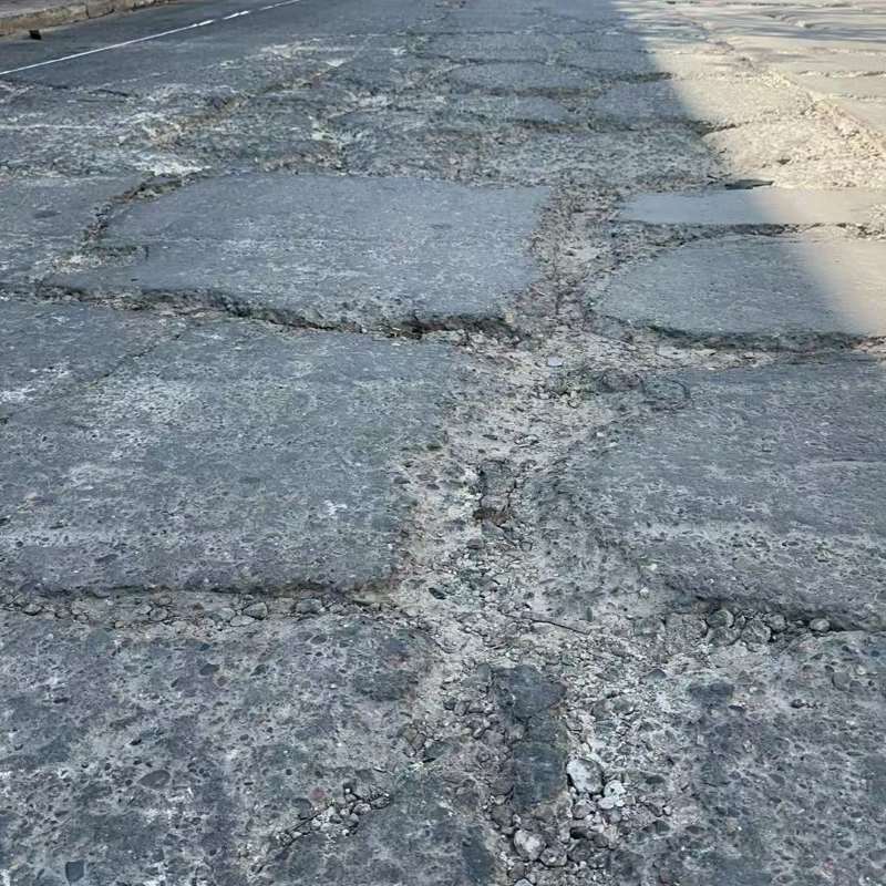 潢川路面起砂露石子修补料